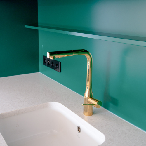 A Townhouse with Petrol-Green Accents